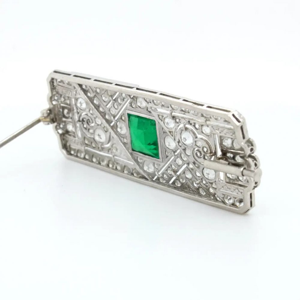 Art Deco Colombian Emerald Onyx and Old Cut Diamond Brooch in Platinum