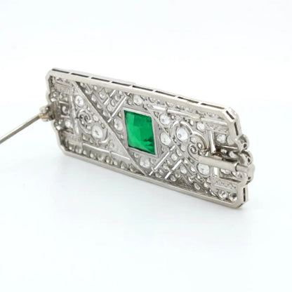 Art Deco Colombian Emerald Onyx and Old Cut Diamond Brooch in Platinum