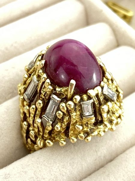 Vintage 4ct Cabochon Burmese Ruby, Diamond and 18ct Gold Cocktail Ring; stunning natural Burmese 4 carat ruby with 0.60cts baguette diamond accents. Circa 1950-1970