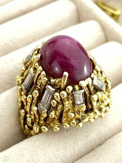 Vintage 4ct Cabochon Burmese Ruby, Diamond and 18ct Gold Cocktail Ring; stunning natural Burmese 4 carat ruby with 0.60cts baguette diamond accents. Circa 1950-1970