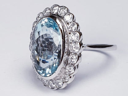 Aquamarine and Diamond Oval Cluster Ring, set in 18ct white gold