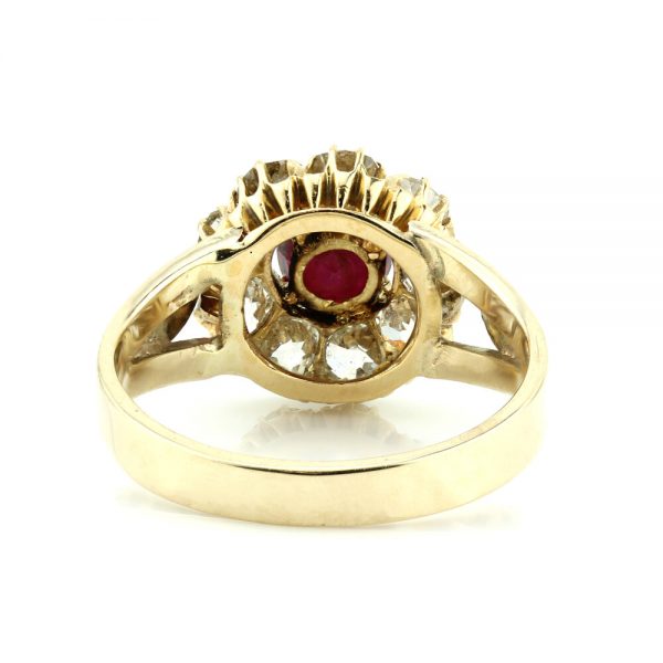 Antique Ruby and Old Cut Diamond Cluster Ring, R0.75ct D1.35ct, in 18ct yellow gold with delicate leaf detailing to split shoulders