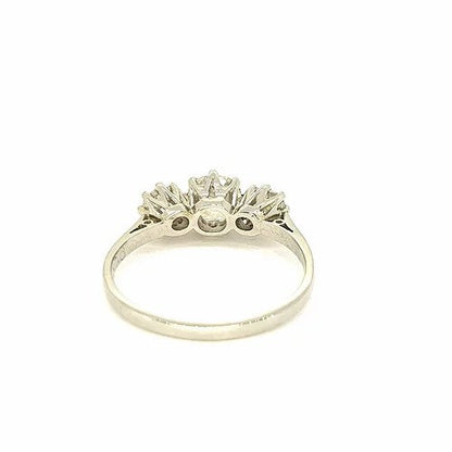 Old Cut Diamond Three Stone Ring; classic trilogy ring set with three old-cut diamonds, 1.00 carat total, claw set, mounted in platinum.