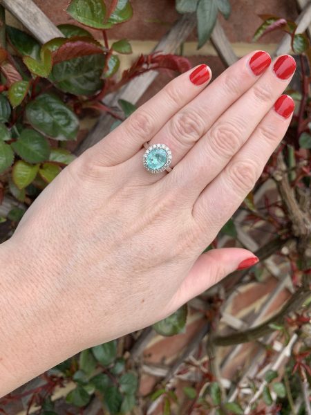 Model on finger Paraiba Tourmaline and Diamond Cluster Ring