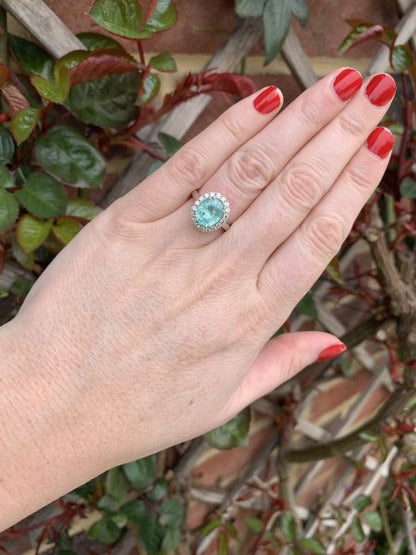 Model on finger Paraiba Tourmaline and Diamond Cluster Ring