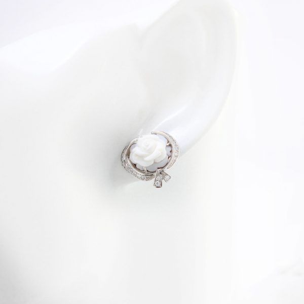 Breguet Rose de la Reine Carved Cameo and Diamond Earrings; adorned with a unique hand-sculpted cameo floral motif and diamond set bow, in 18ct white gold, Signed