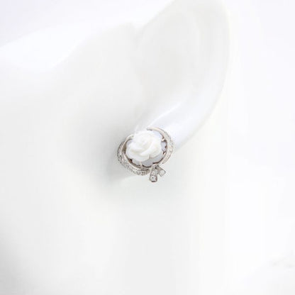 Breguet Rose de la Reine Carved Cameo and Diamond Earrings; adorned with a unique hand-sculpted cameo floral motif and diamond set bow, in 18ct white gold, Signed