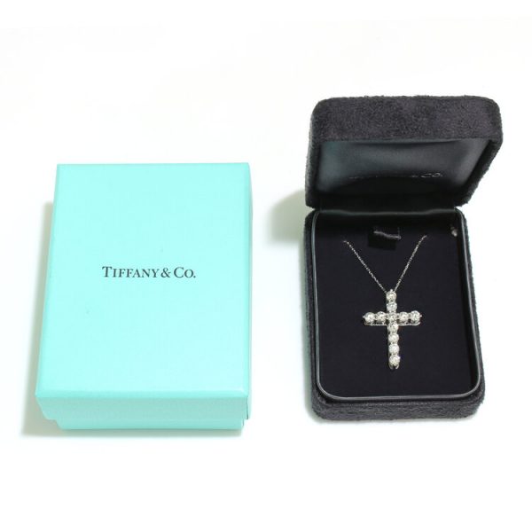 Tiffany and Co Diamond Cross Pendant; set with 11 round brilliant-cut diamonds totalling 2.20 carats, in 18ct white gold, with original box
