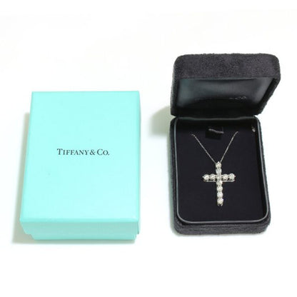 Tiffany and Co Diamond Cross Pendant; set with 11 round brilliant-cut diamonds totalling 2.20 carats, in 18ct white gold, with original box