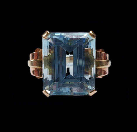 Vintage 18.50ct Aquamarine Cocktail Ring in Bi Colour Gold; large 18.50 carat emerald-cut aquamarine set in red and yellow gold with scroll shoulders, American, Circa 1930