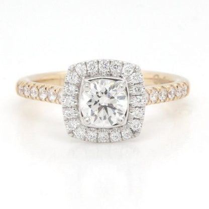 Brilliant Cut Diamond and 18ct Yellow Gold Cluster Ring; featuring a 0.53 carat brilliant cut diamond set in platinum within a surround of brilliant cut diamonds, diamond-set yellow gold shoulders, with GIA certificate