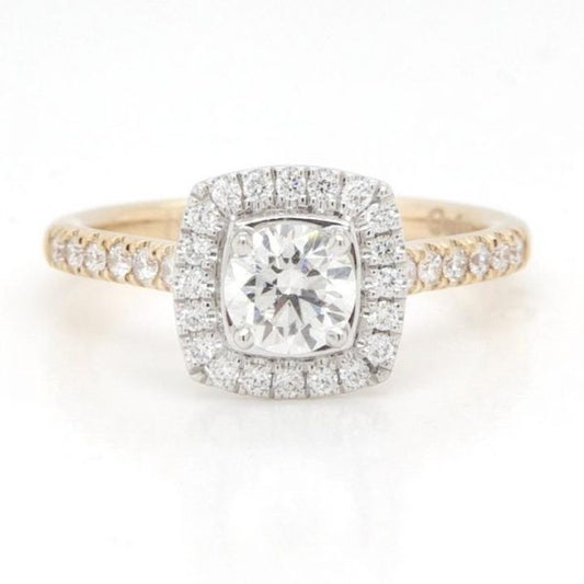 Brilliant Cut Diamond and 18ct Yellow Gold Cluster Ring; featuring a 0.53 carat brilliant cut diamond set in platinum within a surround of brilliant cut diamonds, diamond-set yellow gold shoulders, with GIA certificate