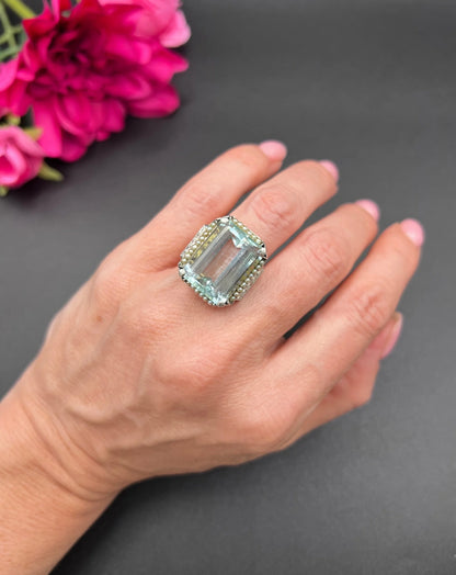 An aquamarine, pearl and diamond large cocktail ring in yellow gold and platinum, modelled on a hand