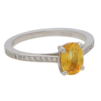 0.80ct Oval Yellow Sapphire and Diamond Solitaire Engagement Ring in Platinum