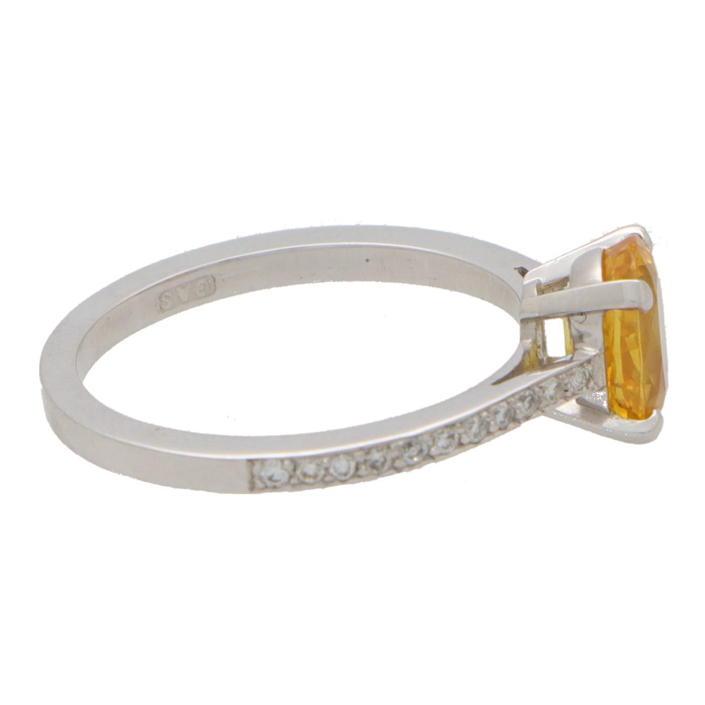 0.80ct Oval Yellow Sapphire and Diamond Solitaire Engagement Ring in Platinum