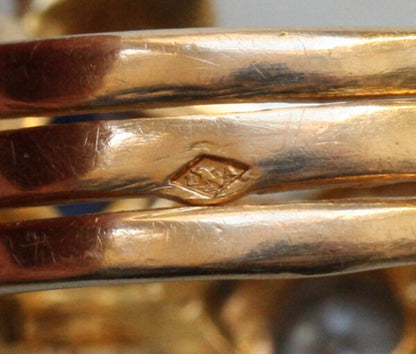 Antique Edwardian Diamond, Sapphire and 18ct Yellow Gold Double Snake Ring; set with a 0.45ct old cut diamond and 0.43ct cushion cut sapphire