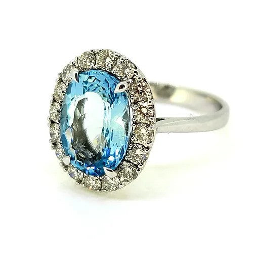 3.39ct Oval Aquamarine and Diamond Halo Cluster Engagement Ring in 18ct white gold