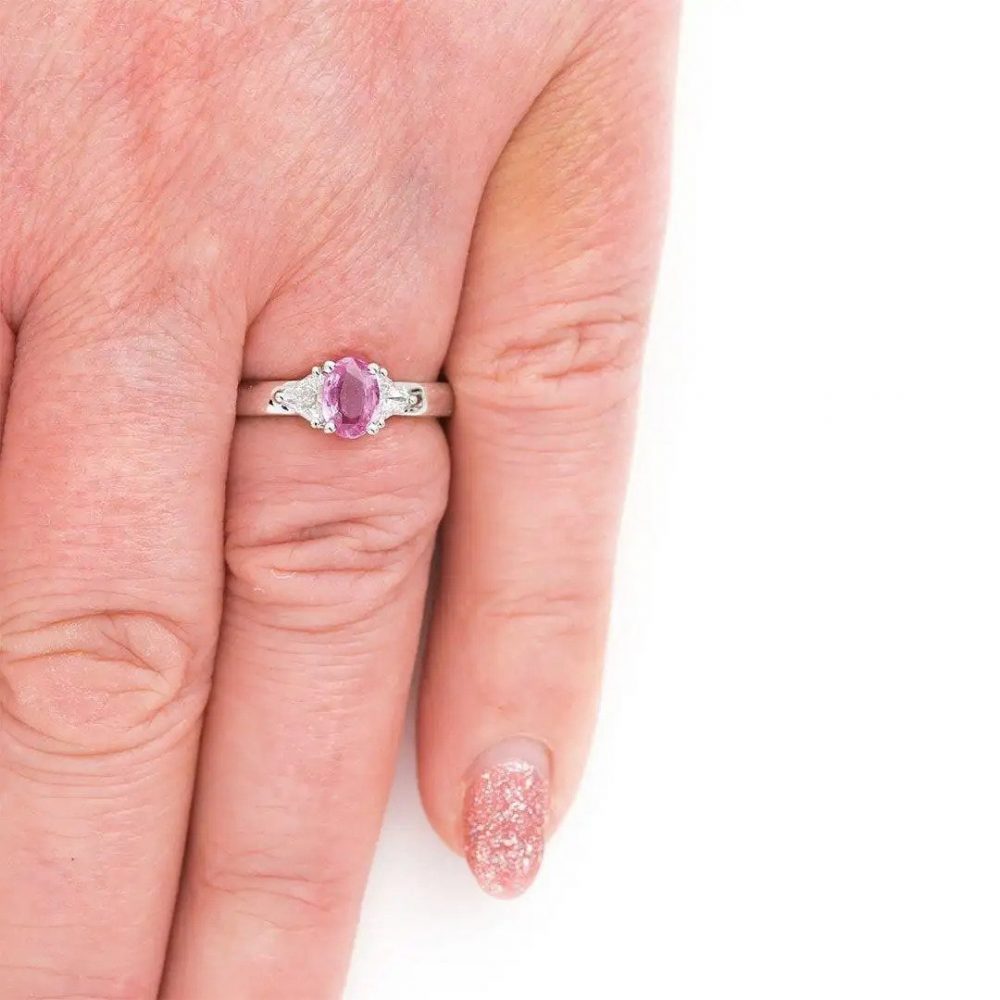 0.84ct Pink Sapphire and Trilliant Diamond Three Stone Ring in 18ct White Gold