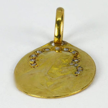 French Madonna and Child 18ct Yellow Gold Charm Pendant with Rose Cut Diamonds; one side depicts the Madonna and child with a rose cut diamond halo, the reverse a sheaf of lilies. Signed F. Rasumny