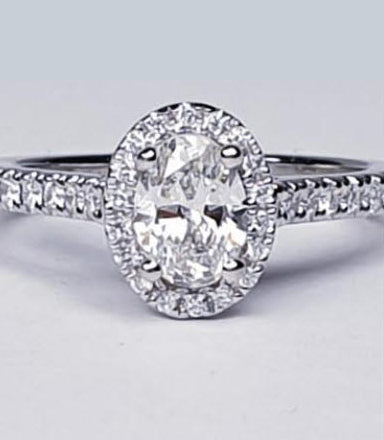 0.50ct Oval Cut Diamond Cluster Engagement Ring in Platinum with GIA Certificate