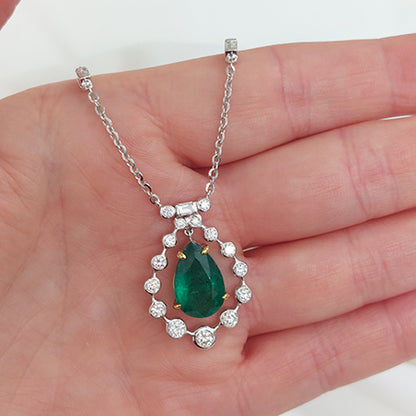 4.85ct Pear Cut Emerald and Diamond Cluster Pendant on Diamond Set Chain