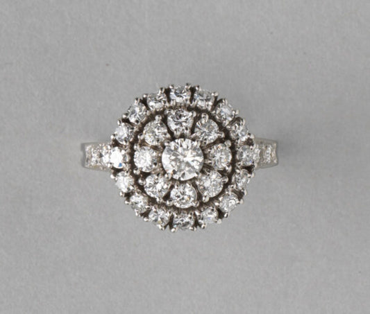 Tiffany and Co Vintage 1.75ct Diamond and Platinum Circular Cluster Ring; central 0.25ct brilliant-cut diamond stone is surrounded by two halos of diamonds, diamond set shoulders, in platinum and iridium, Signed, Circa 1950