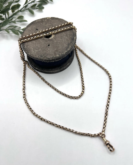 A long rose gold link necklace with swivel clasp