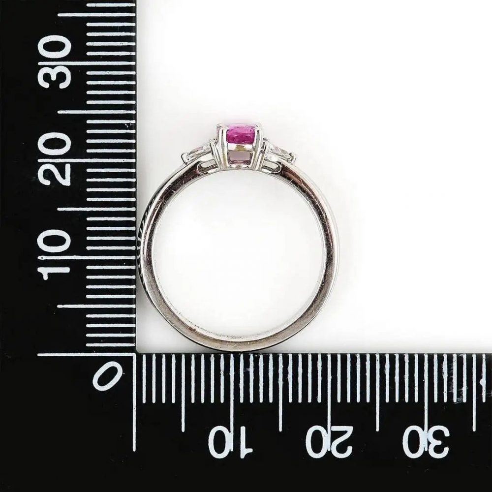0.84ct Pink Sapphire and Trilliant Diamond Three Stone Ring in 18ct White Gold
