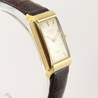 Patek Philippe Vintage Rectangular 18ct Yellow Gold Manual Watch, Ref 1531, silver dial, small seconds subdial at 6, Patek Philippe brown leather strap, with service papers, Circa 1940-50s