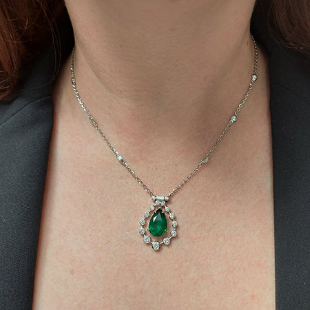 4.85ct Pear Cut Emerald and Diamond Cluster Pendant on Diamond Set Chain