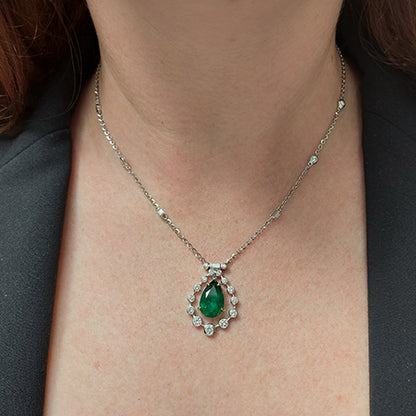 4.85ct Pear Cut Emerald and Diamond Cluster Pendant on Diamond Set Chain