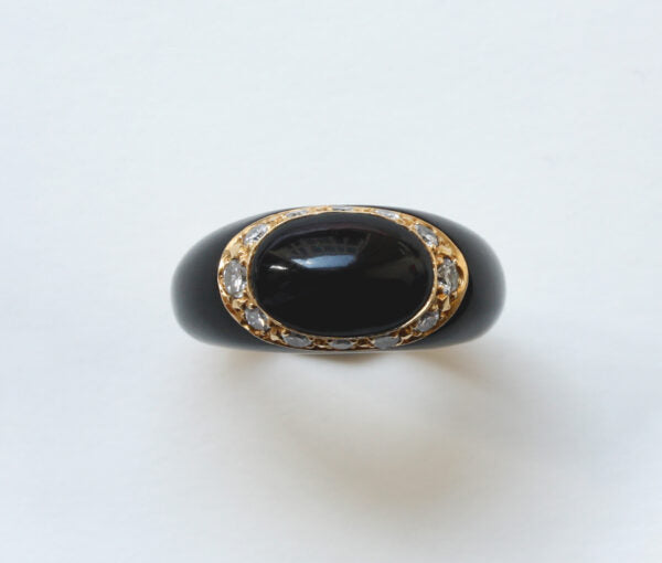 Van Cleef and Arpels Onyx, Diamond and 18ct Yellow Gold Fidji Ring; Signed and numbered Van Cleef & Arpels, Model Fidji, 0.51 carat total.