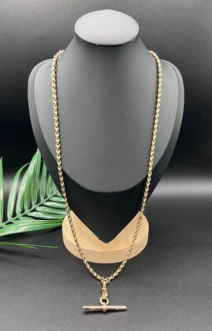 A rose gold tulip link chain necklace with a dog clip clasp and T-bar