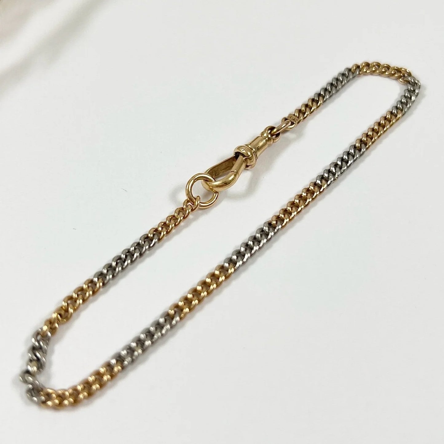 Antique 18 Carat Gold and Platinum Curb Link Bracelet with Swivel Clasp, Circa 1920