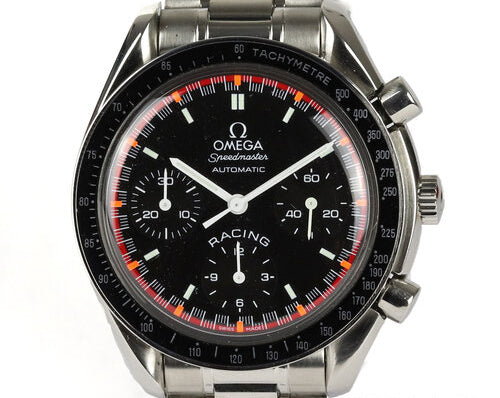 Gents Omega Speedmaster Racing Michael Schumacher World Champion 2000 Limited Edition 39mm Stainless Steel Automatic Chronograph, black dial with red rim, baton hour markers, outer Tachymetre track, Omega stainless steel bracelet with an Omega single deployment clasp