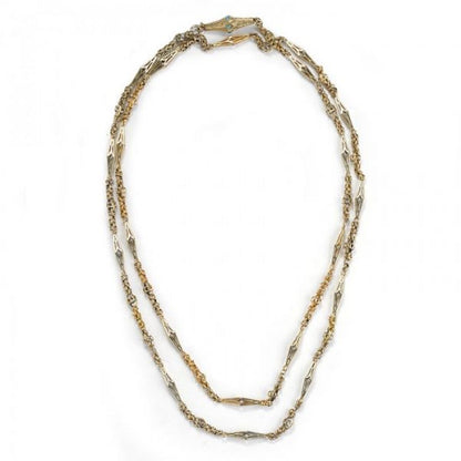 Antique Victorian Gold Fancy Link Long Chain Necklace, comprised of handmade open links and decorative twisted interwoven links decorated with open pierced elongated rhombus motifs, engraved turquoise set torpedo rhombus clasp. Circa 1875