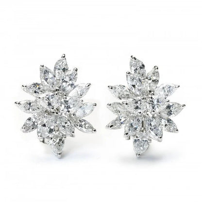 Fancy Diamond Cluster Earrings, set with 10.61 carats of pear-shape and marquise-shape diamonds in an abstract navette design, all claw set and mounted in platinum with 18ct white gold fittings