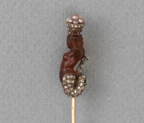 Antique Victorian Carved Agate Mermaid Stickpin; with silver hair, tail, and basket edge embellished with rose-cut diamonds, holding a basket of fine pearls