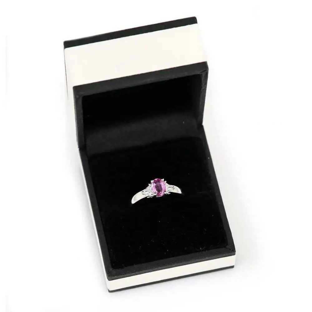 0.84ct Pink Sapphire and Trilliant Diamond Three Stone Ring