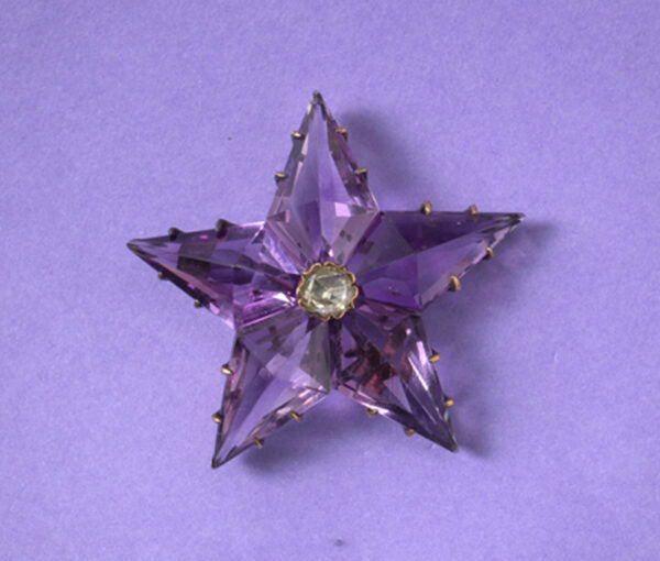 Antique Victorian Amethyst and Diamond Star Pendant/Brooch and Earrings Suite; set with high kite shaped amethysts and a rose cut diamond in the centre.
