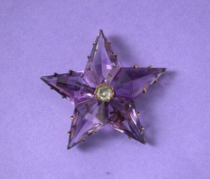 Antique Victorian Amethyst and Diamond Star Pendant/Brooch and Earrings Suite; set with high kite shaped amethysts and a rose cut diamond in the centre.