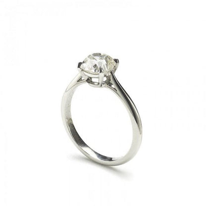 Cushion Cut Diamond Solitaire Engagement Ring in Platinum; four-claw set with a 1.64ct K colour VS1 clarity cushion old-cut diamond, with certificate