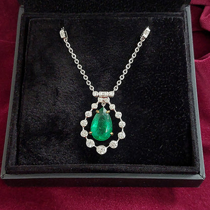 4.85ct Pear Cut Emerald and Diamond Cluster Pendant on Diamond Set Chain