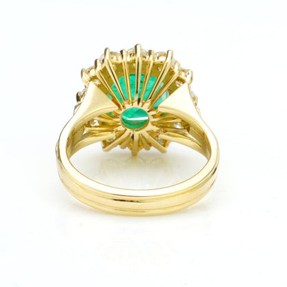 3.80ct Emerald Cut Emerald and Diamond Cluster Ring, in 18ct yellow gold with triple-split shoulders