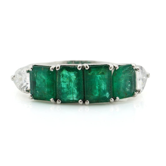 Vintage Chantecler 1.38ct Emerald and Pear Cut Diamond Ring; four emerald-cut emeralds flanked either side by a pear-cut diamond in 18ct white gold. Made in Italy, Capri, Circa 1990s