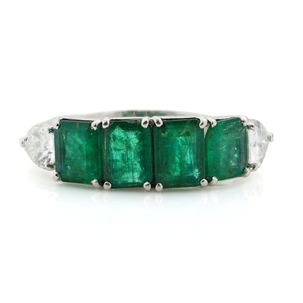Vintage Chantecler 1.38ct Emerald and Pear Cut Diamond Ring; four emerald-cut emeralds flanked either side by a pear-cut diamond in 18ct white gold. Made in Italy, Capri, Circa 1990s