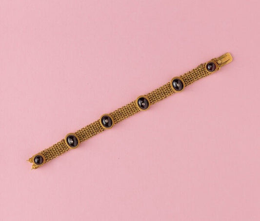 Antique Victorian 18ct Gold Neo Etruscan Bracelet with Garnets and Diamonds; delicately woven links set with cabochon cut garnets and rose cut diamonds. Circa 1870