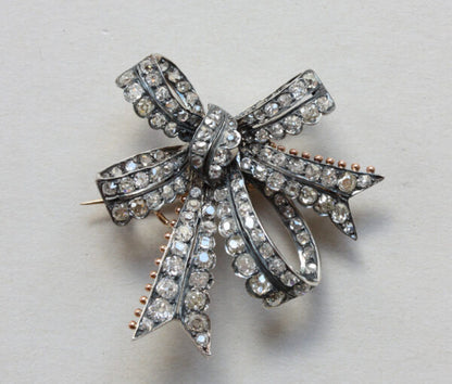 Antique Victorian Old Cut Diamond Double Bow Brooch, 3.40 carat total, set in silver and backed with gold, England, Circa 1880.
