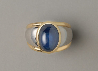 Vintage 11.87ct Cabochon Sapphire, Gold and Platinum Dress Ring; set with an oval cabochon-cut 11.87 carat natural untreated sapphire. France