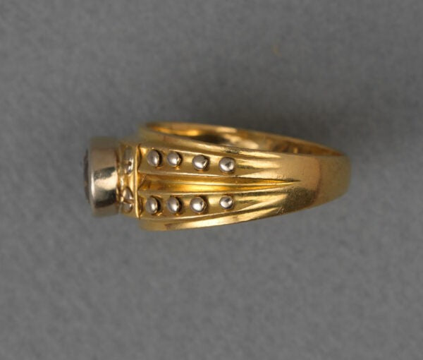 Vintage 1.00ct Fancy Brown Diamond Nail Ring; 18ct yellow gold shank accented with white gold nail detail, Dutch, Circa 1970.